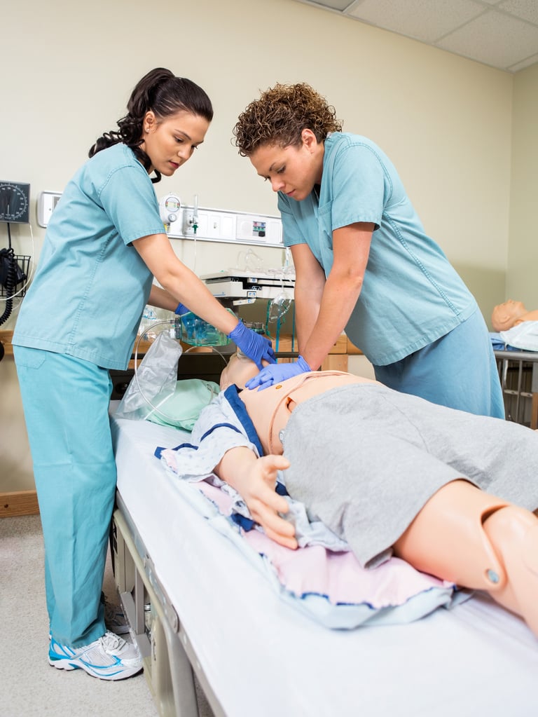 Nurses Performing CPR on Dummy Patient